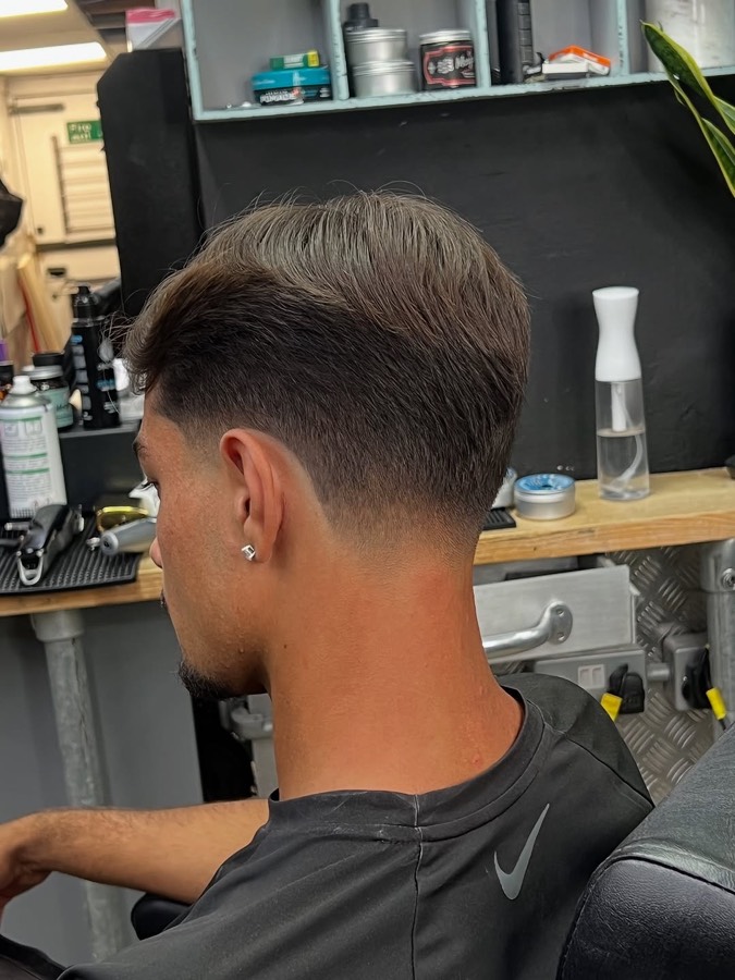 A textured crop finished tight at the sides.