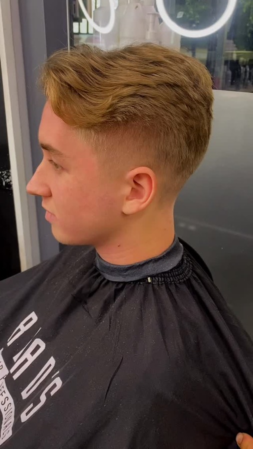 A child's cut finished with a clean taper.