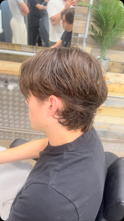A longer layered cut being finished.
