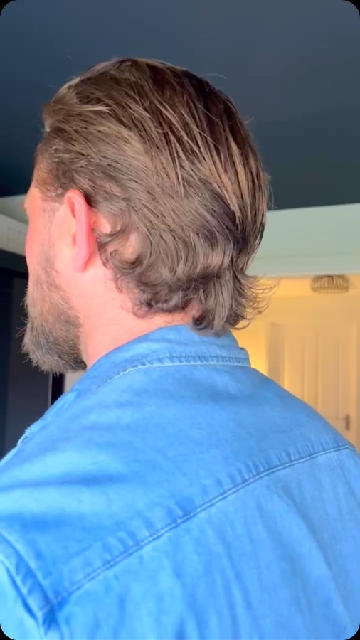 A longer textured cut swept back.